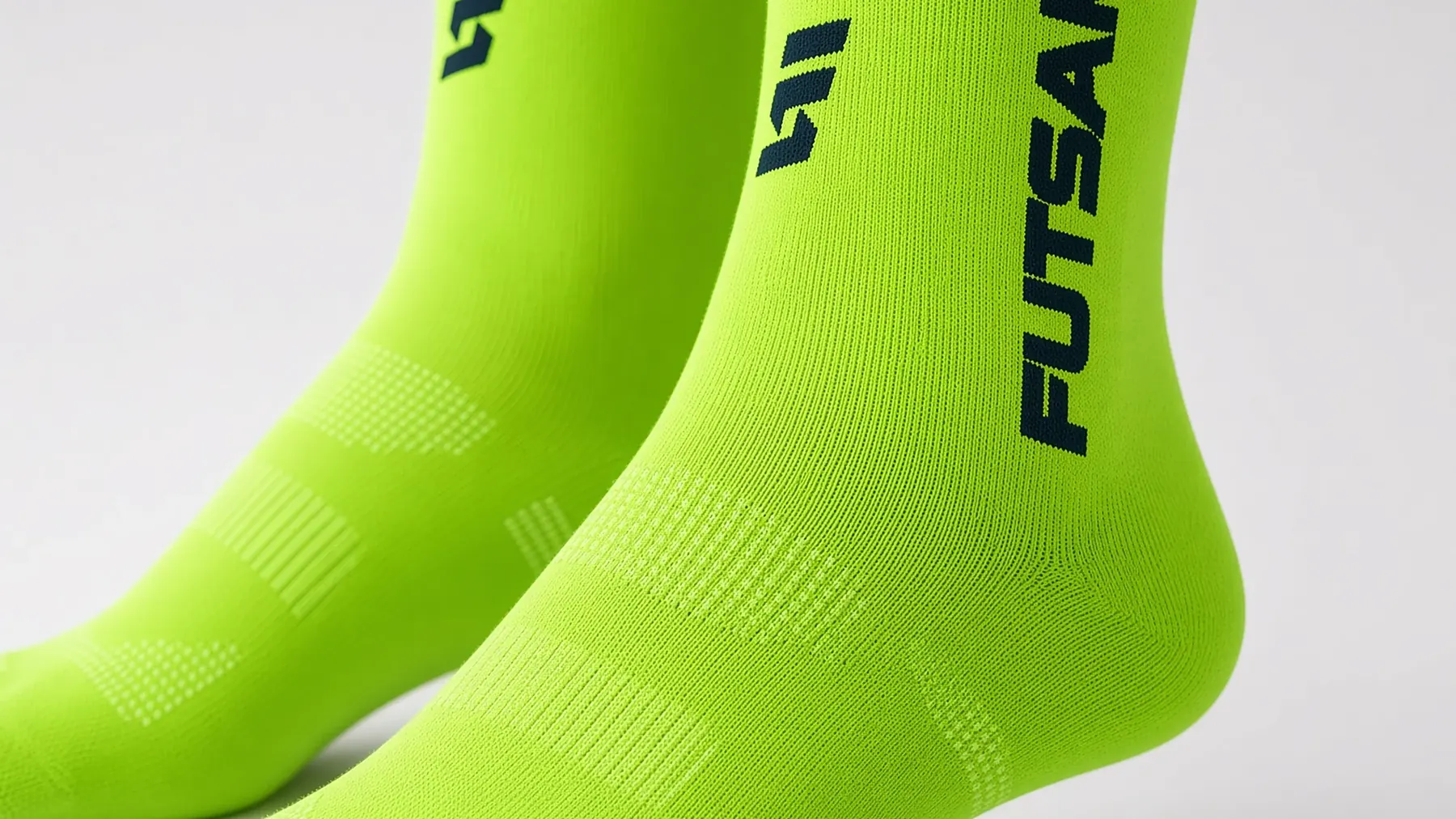Close detail of the knit structure and ventilation zones on Futsak Volt